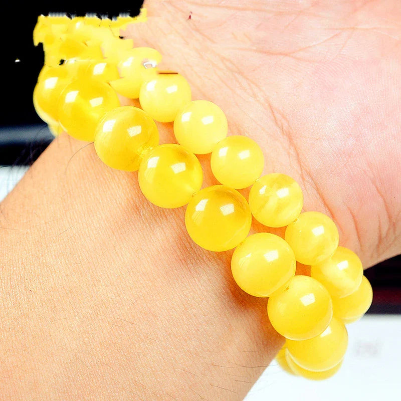 Elegant beeswax bracelets in a range of sizes, showcasing the natural beauty and premium craftsmanship of these premium Russian-inspired accessories.