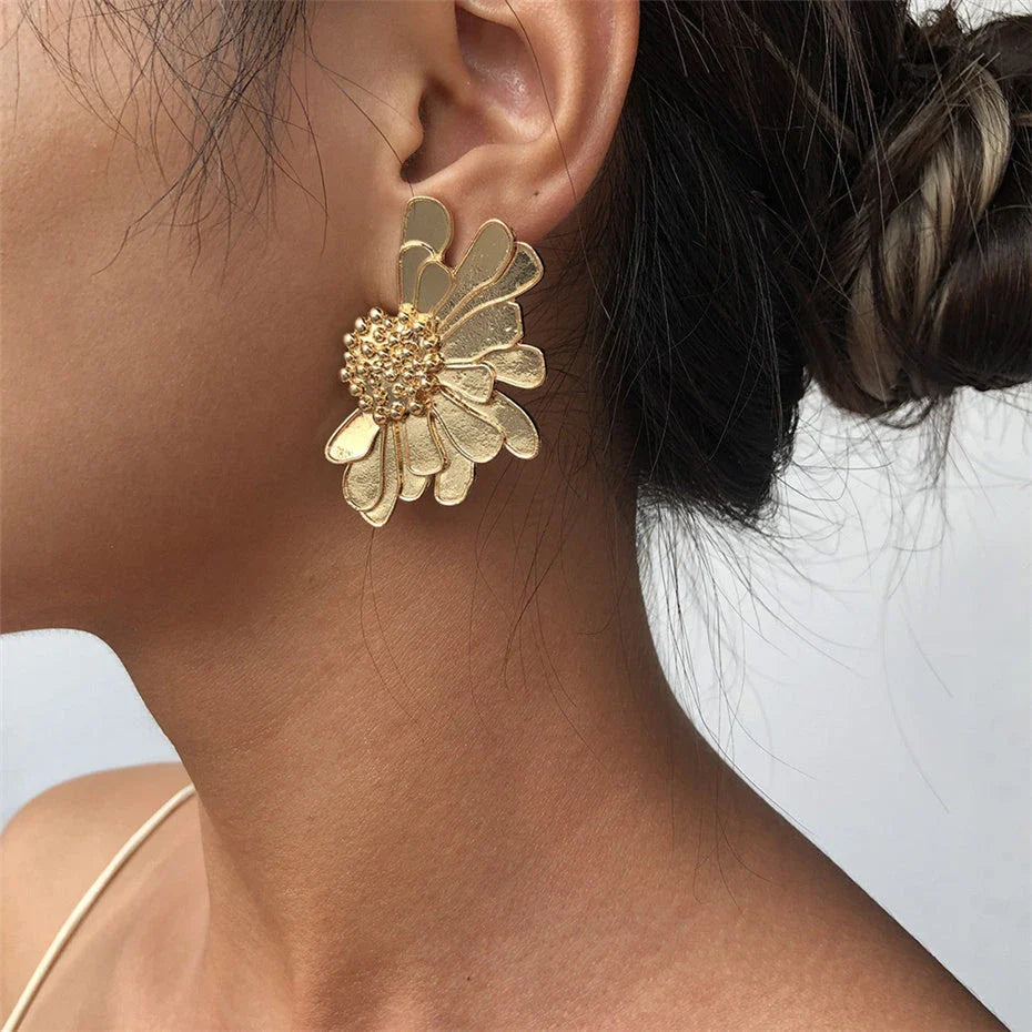 Vibrant, multi-coloured floral petal stud earrings with a blend of bohemian and modern influences