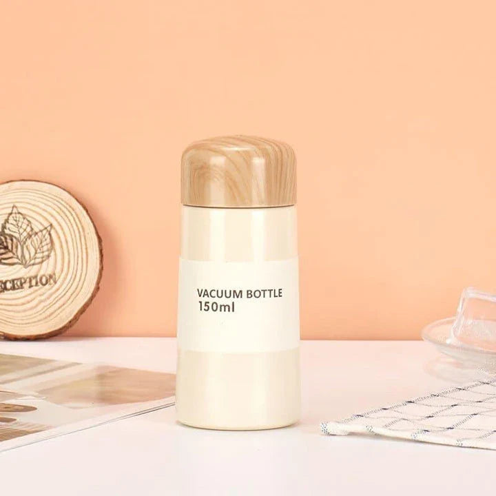 Stylish floral double-wall insulated water bottle with straw, made of high-quality stainless steel for long-lasting use and temperature control.