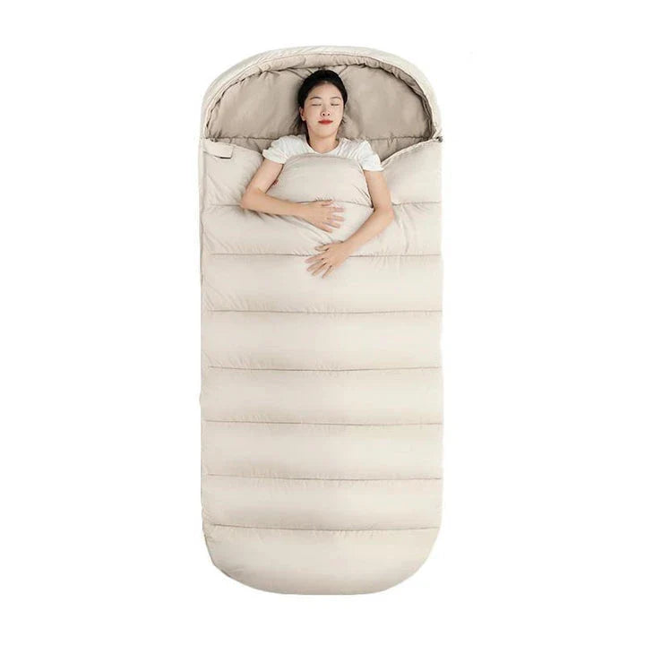 Premium 3-season sleeping bag with spacious design, warm yet breathable fabric, and removable liner for easy cleaning