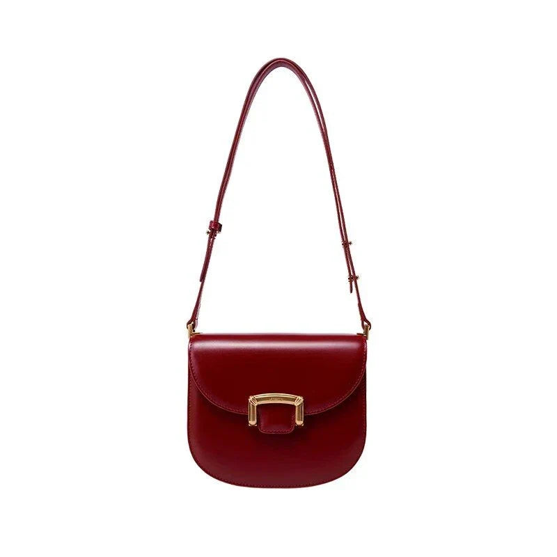 Premium high-end British wedding shoulder bag in brown, with a unique saddle shape design and hardwearing leather exterior
