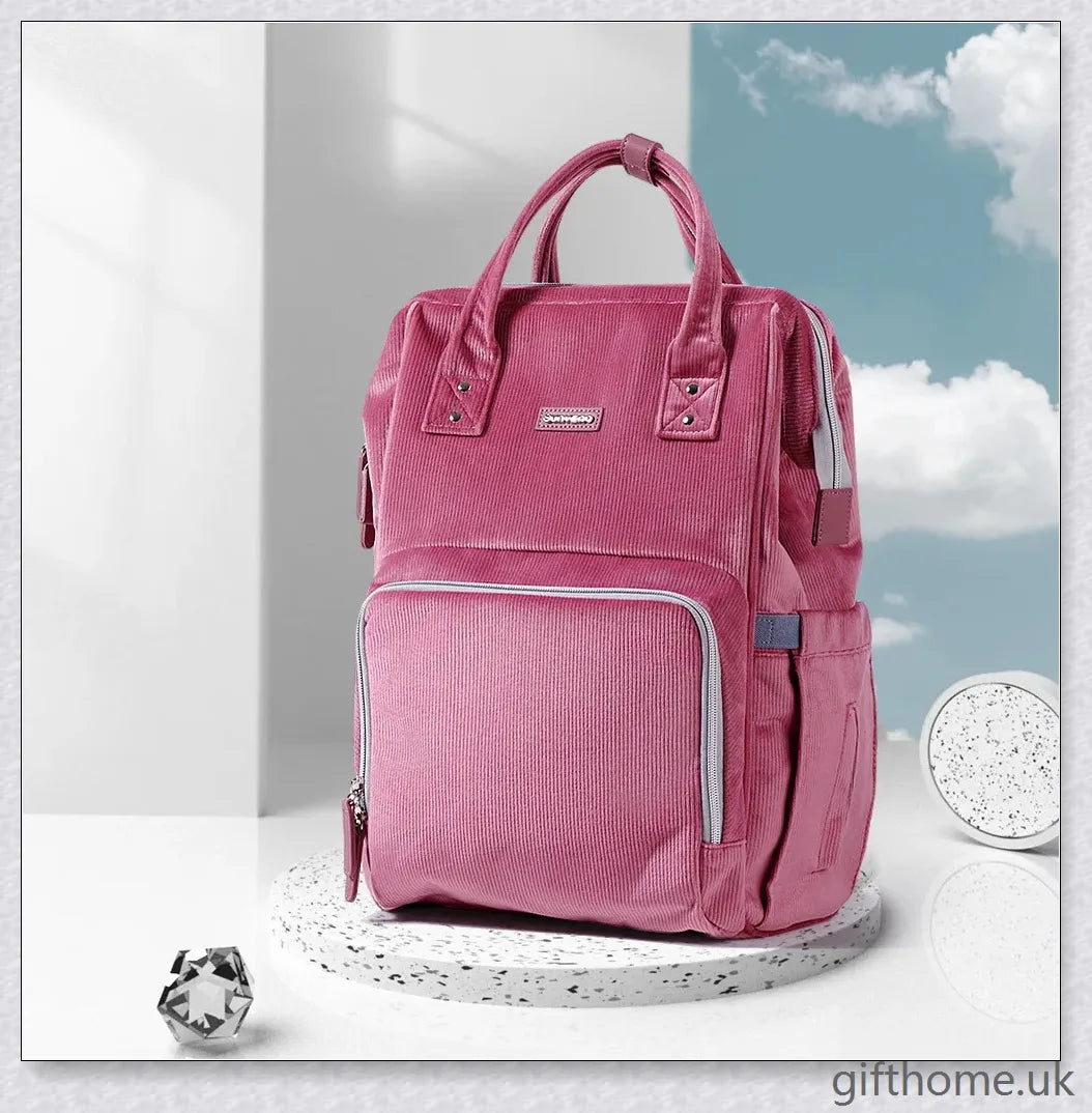 Premium polyester nappy backpack with multiple pockets and adjustable straps, perfect for modern British parents