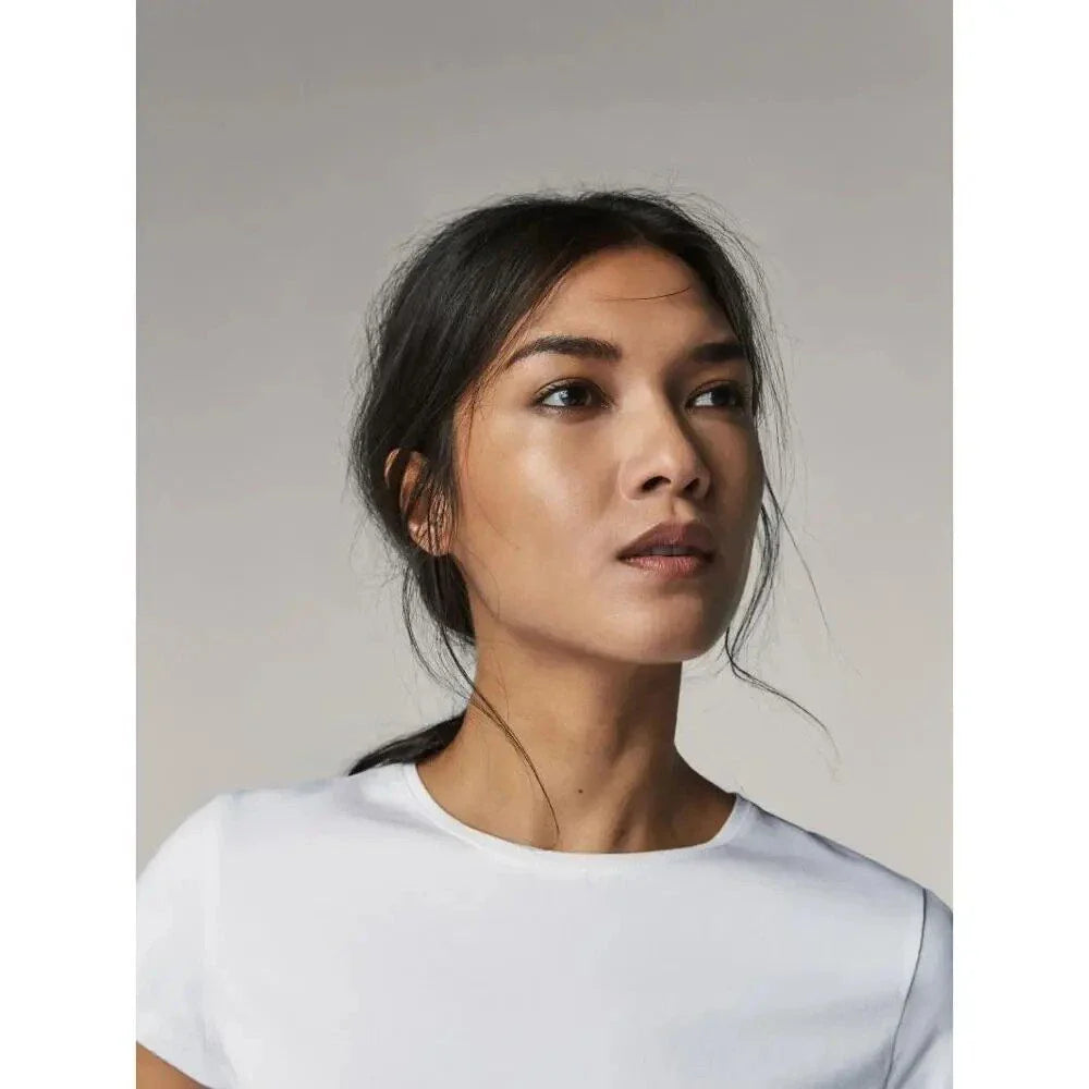 A mid-length knitted sheath dress with a round neckline, long sleeves, and a printed pattern, made of premium French velvet fabric.