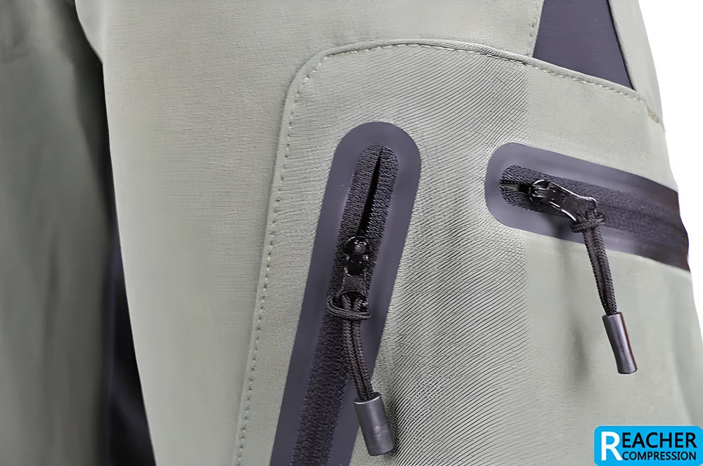 Men's cycling shorts in black and green colours, with adjustable waistband and zipper pockets for storage
