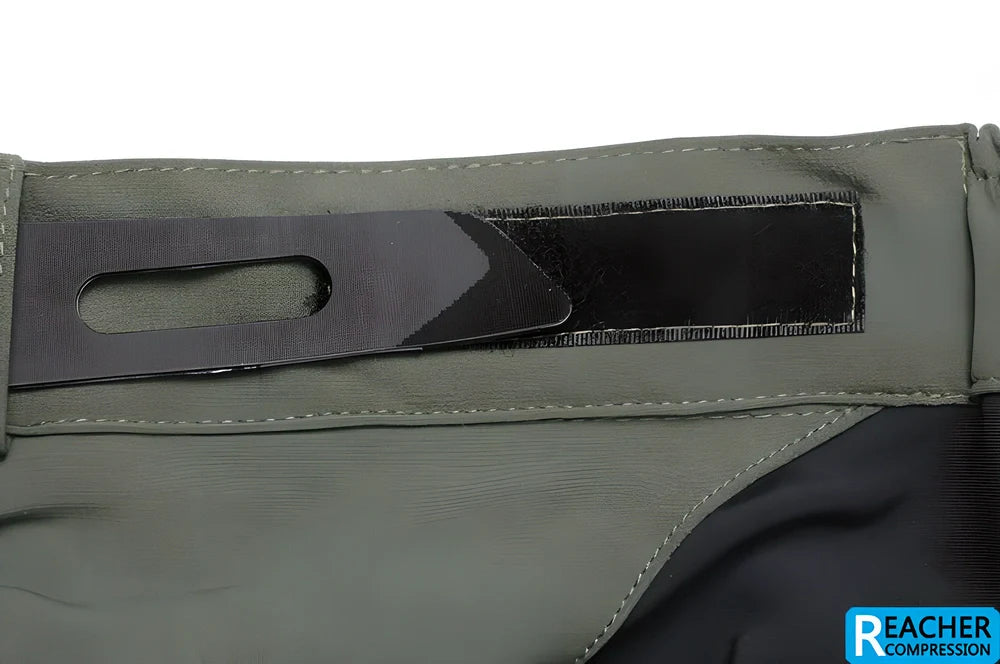 Men's cycling shorts in black and green colours, with adjustable waistband and zipper pockets for storage
