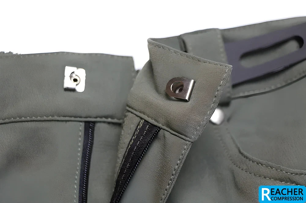 Men's cycling shorts in black and green colours, with adjustable waistband and zipper pockets for storage
