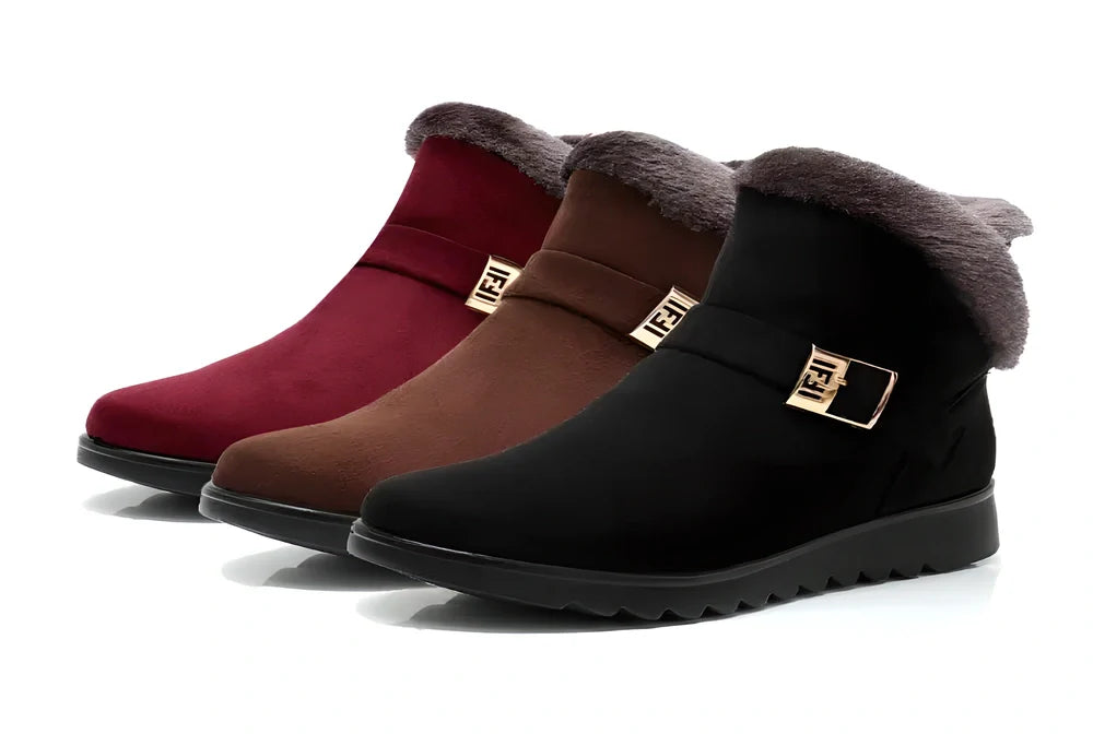 Elegant women's winter boots with warm faux fur lining, durable rubber sole, and sleek, versatile design