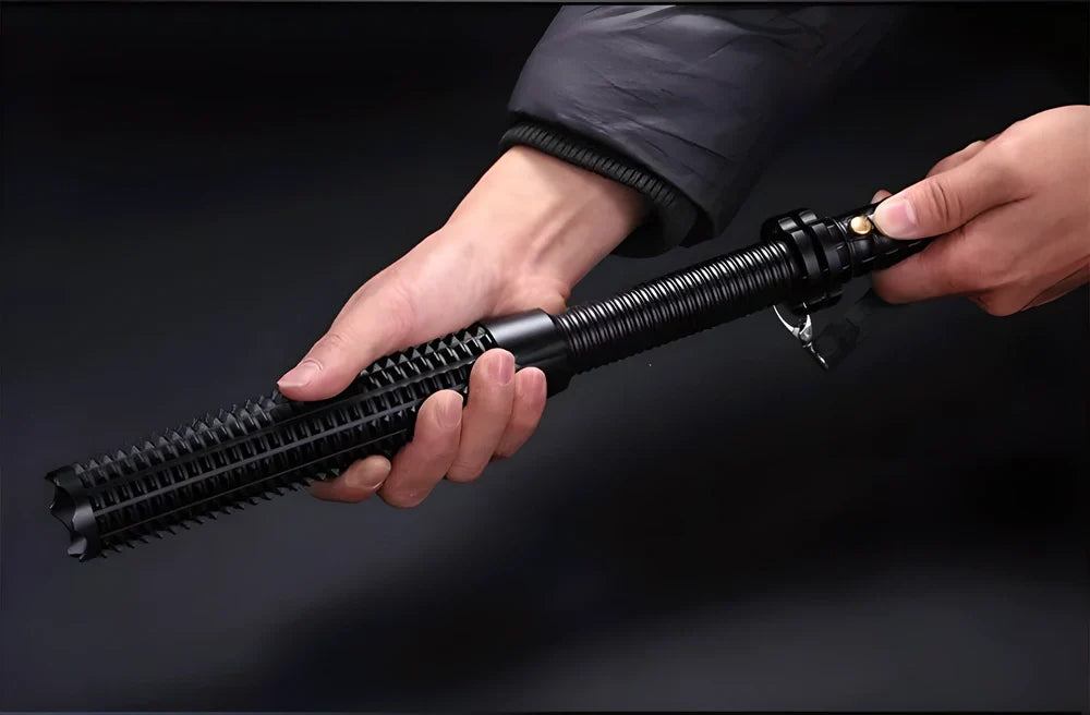 Powerful telescoping tactical LED torch baton with adjustable zoom, high/low/strobe modes, and durable waterproof design