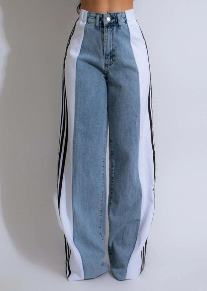 Stylish high-waist denim pants with patchwork details, available in a range of trendy color combinations