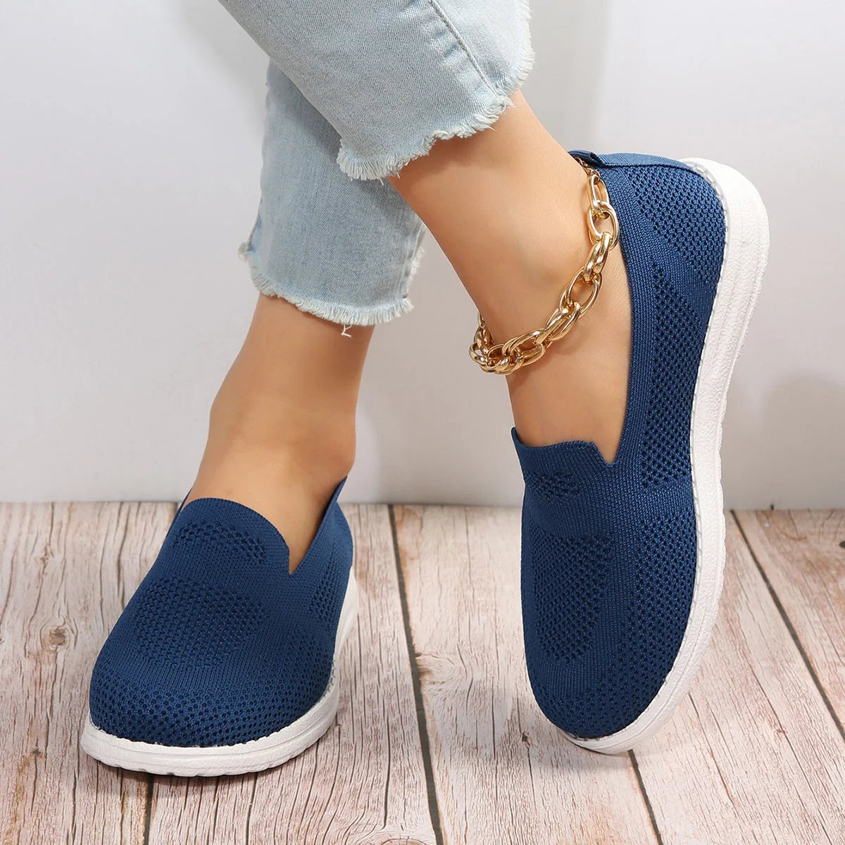 Women's breathable mesh slip-on loafers in white, beige, black, and blue
