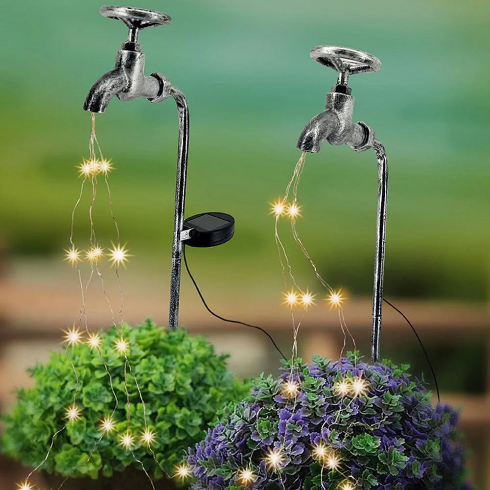 Solar-powered garden lamp with water faucet design for outdoor decoration