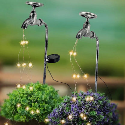 Solar-powered garden lamp with water faucet design for outdoor decoration