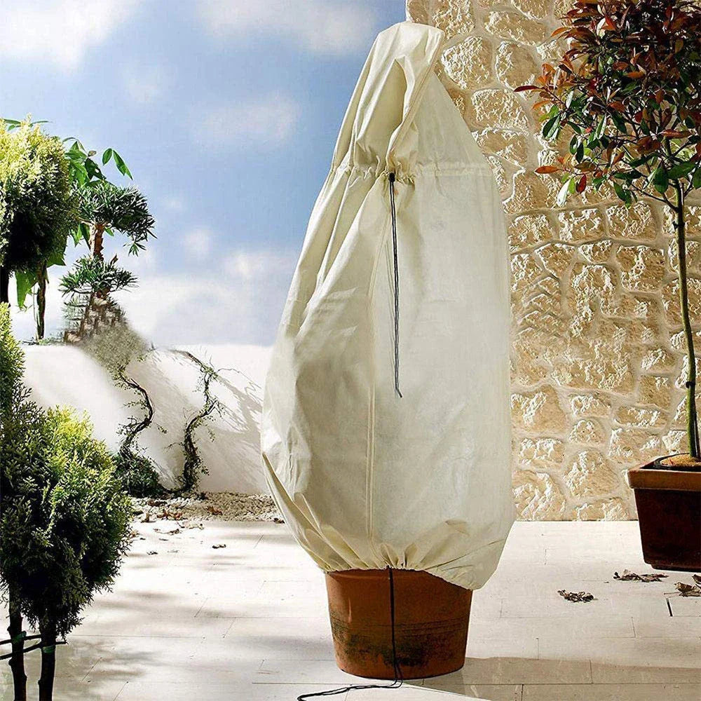 Non-woven plant protection cover in beige, designed to safeguard garden plants from frost, heavy rain, and pests during the British winter.