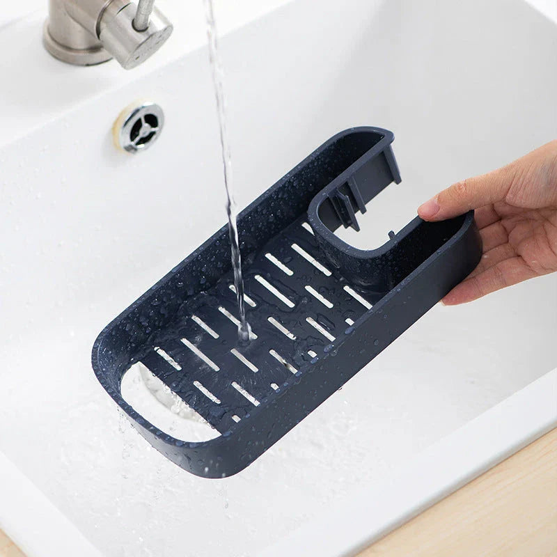 A versatile faucet-mounted sink caddy with compartments for storing sponges, detergent, and other kitchen essentials