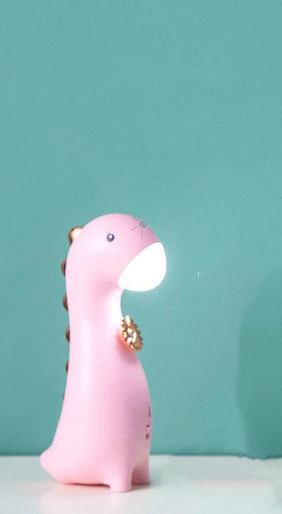 Adorable dinosaur LED night light with touch control in pink, blue, and green