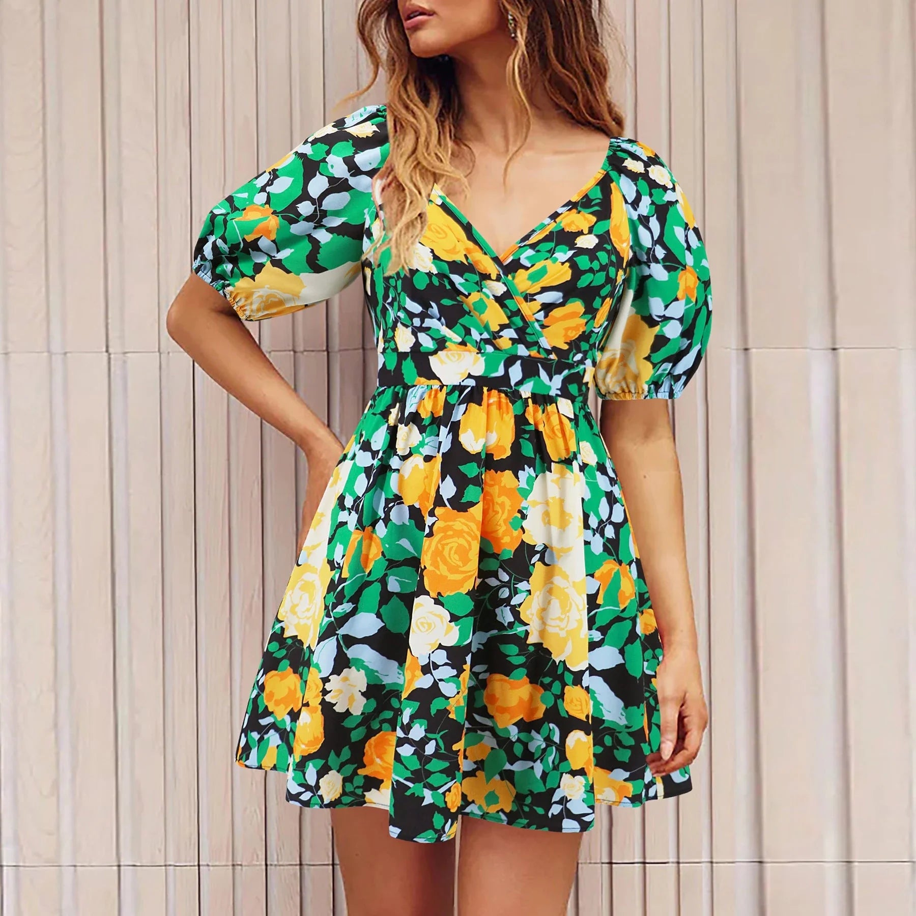 Stylish floral dress with V-neck and lantern sleeves, perfect for summer vacations and warm-weather occasions