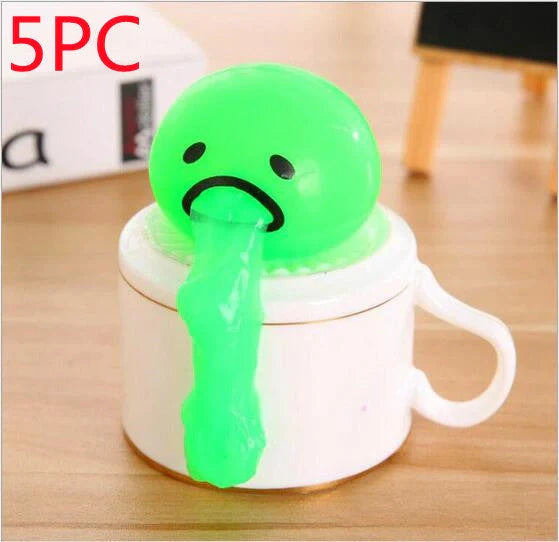 Gudetama Vomiting Egg Toy in green, orange, pink, and yellow