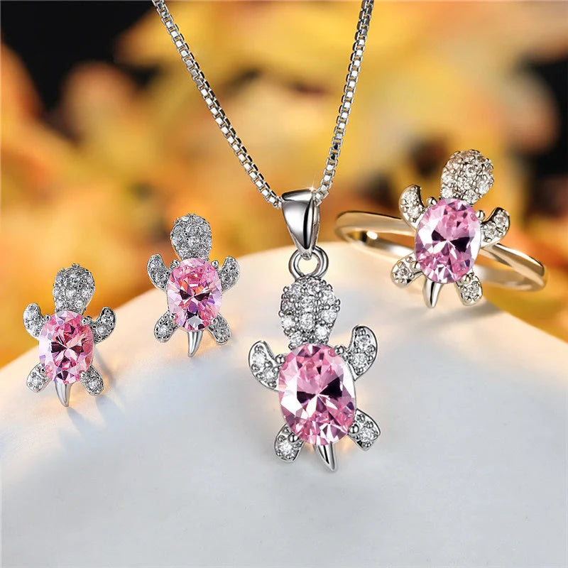 Stylish turtle pendant necklace with vibrant rainbow stones, perfect for women and children.
