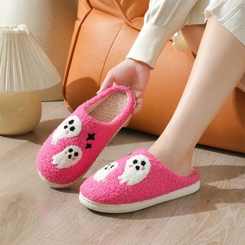 Cozy Halloween-themed cartoon ghost slippers with soft cotton construction and non-slip soles for comfortable indoor wear