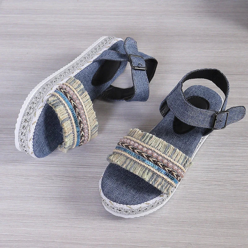 Stylish denim tassel sandals for women with thick flat sole, perfect for summer.