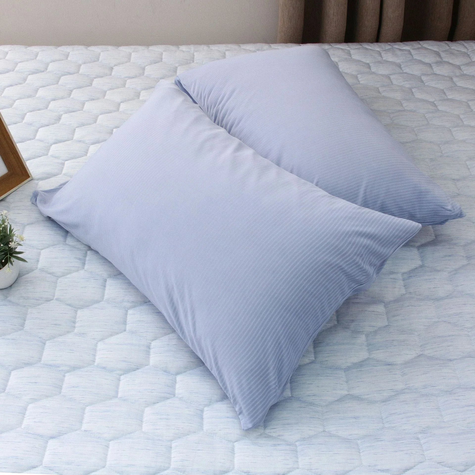A premium polyester cooling blanket with innovative Japanese cooling fibers that provides refreshing temperature regulation for a comfortable sleep experience