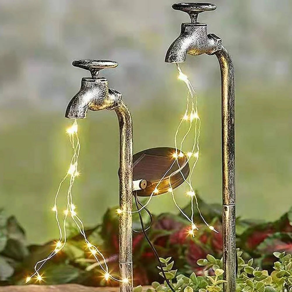 Solar-powered garden lamp with water faucet design for outdoor decoration