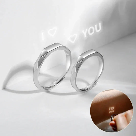 Stylish sterling silver rings with a hidden love pattern design, perfect for romantic gifts or personal accessorizing.