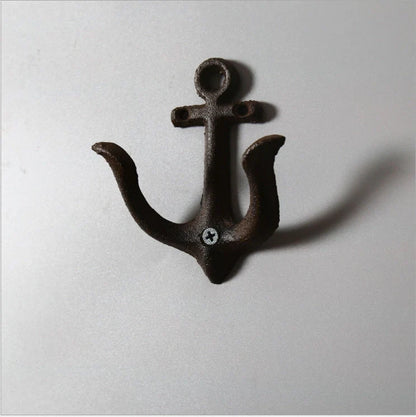 Industrial-style wrought iron wall hook with multiple rows for hanging coats and bags