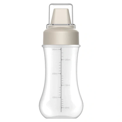 Five-hole scale squeezing sauce bottle with lid for precise kitchen use