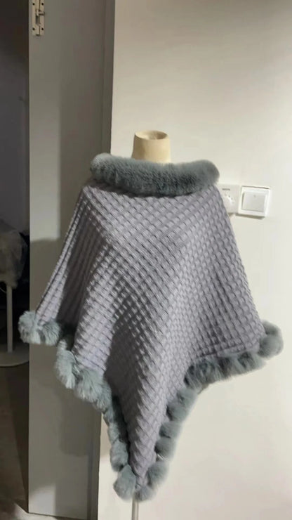 Luxurious rabbit fur wrap shawl in various colours, featuring a soft, cosy collar and a flattering cropped fit for a chic, polished look.