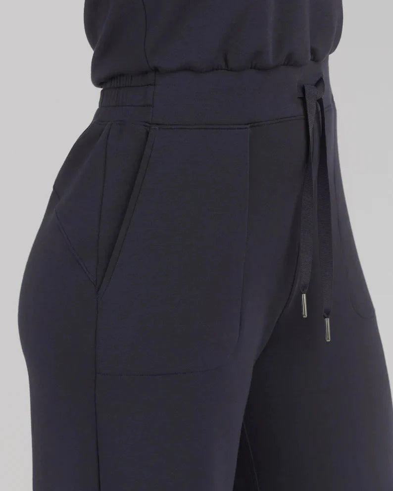 Women's lace-up jumpsuit pants in polyester, sleeveless design, available in multiple colors and sizes