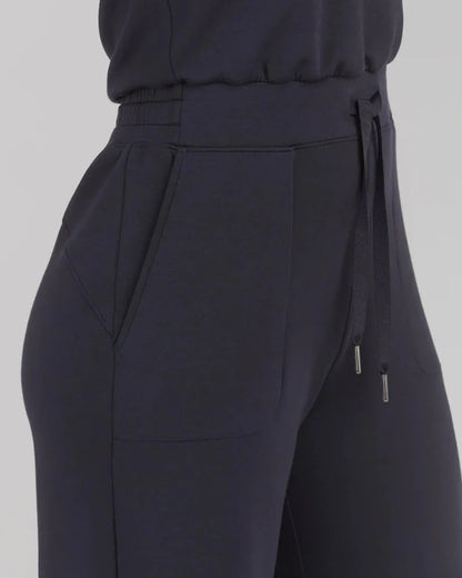Women's lace-up jumpsuit pants in polyester, sleeveless design, available in multiple colors and sizes