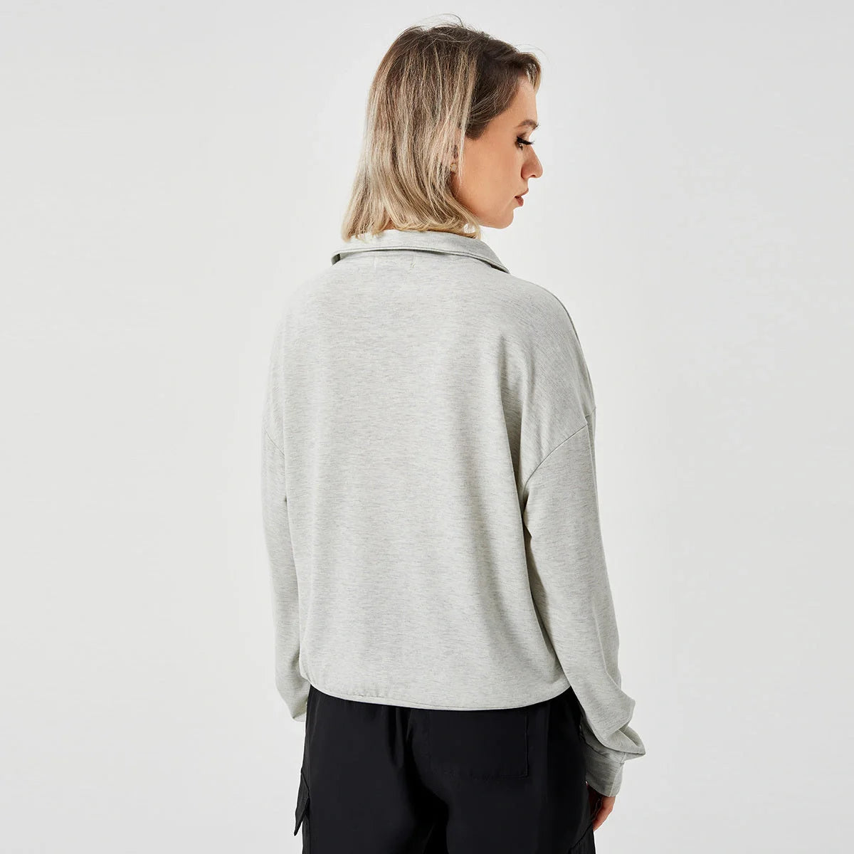 Women's pullover sweatshirt in white, grey, and brown, available in sizes S to XL