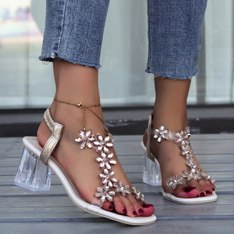 Stylish floral sandals with transparent high square heels for women, available in black and apricot colours