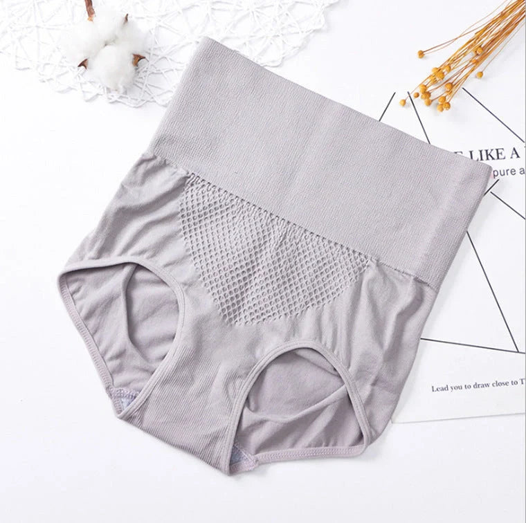 Seamless high-waist slimming briefs in various colours, offering a flattering and comfortable fit for the British consumer.