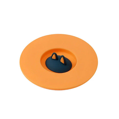 Spill-Proof Cat Ear Silicone Drink Lid in various colors, including pink, orange, and blue