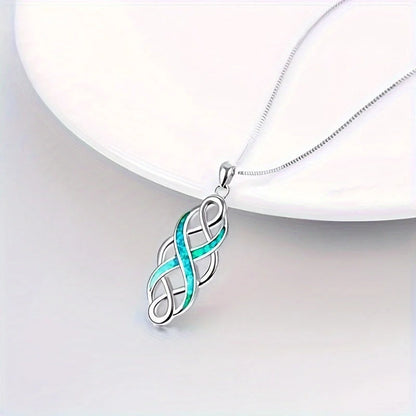 Elegant blue Celtic knot pendant necklace with ellipse and ring design, showcasing the rich cultural heritage of Ireland