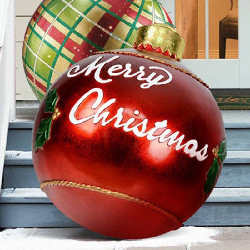 Vibrant inflatable Christmas baubles in a variety of colours and patterns, perfect for outdoor holiday decoration