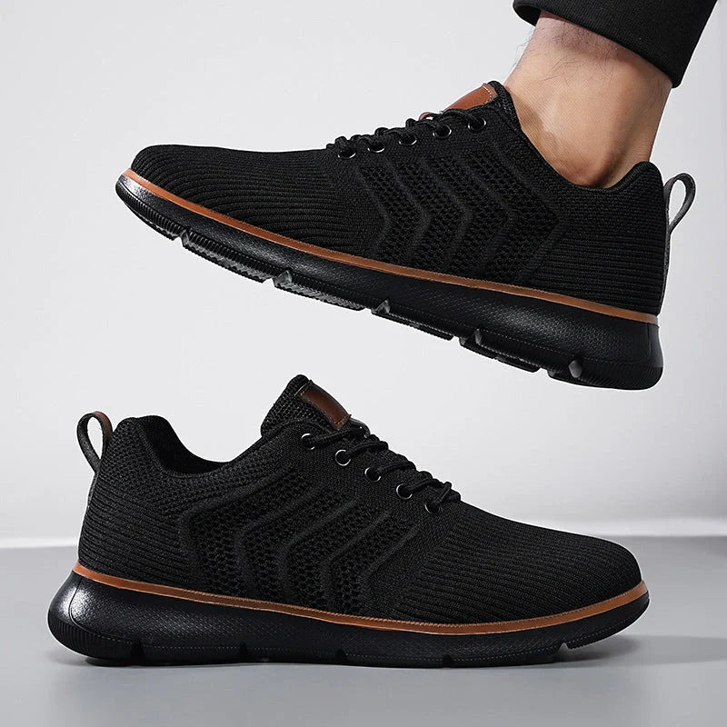 Men's black lace-up mesh sneakers with round toe design