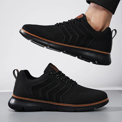 Men's black lace-up mesh sneakers with round toe design
