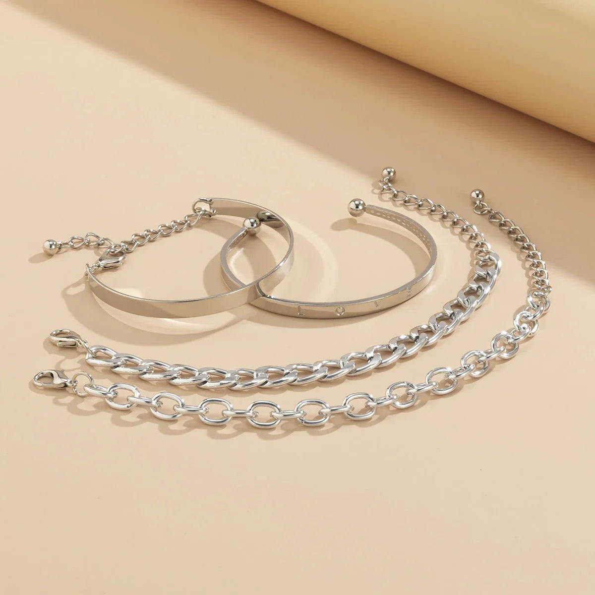 Simple and Elegant C-Shaped Hollow Chain Bracelet Set in Gold and Silver