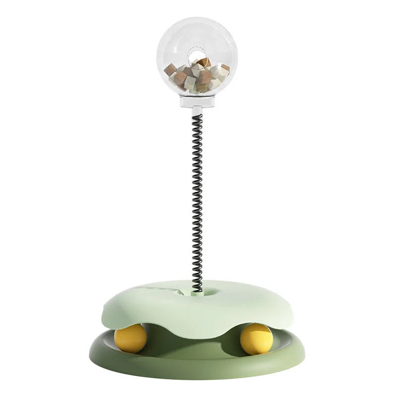 Interactive cat toy with treat dispenser and spring ball in blue, yellow, green