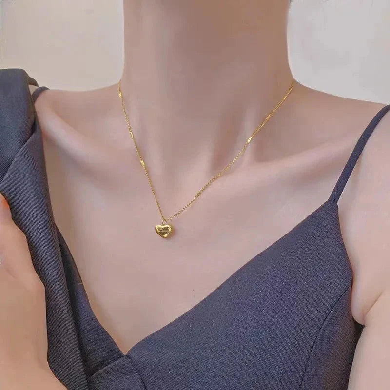 Vintage gold titanium steel heart pendant necklace with sectional chain