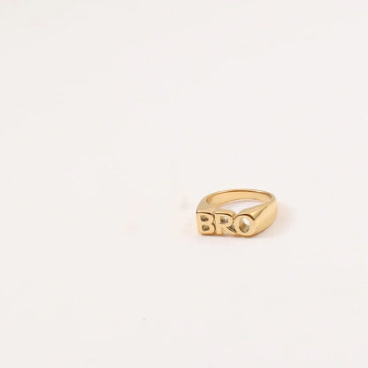 Women's Letter Seal Titanium Steel Plating 18K Gold Ring in various gold tones