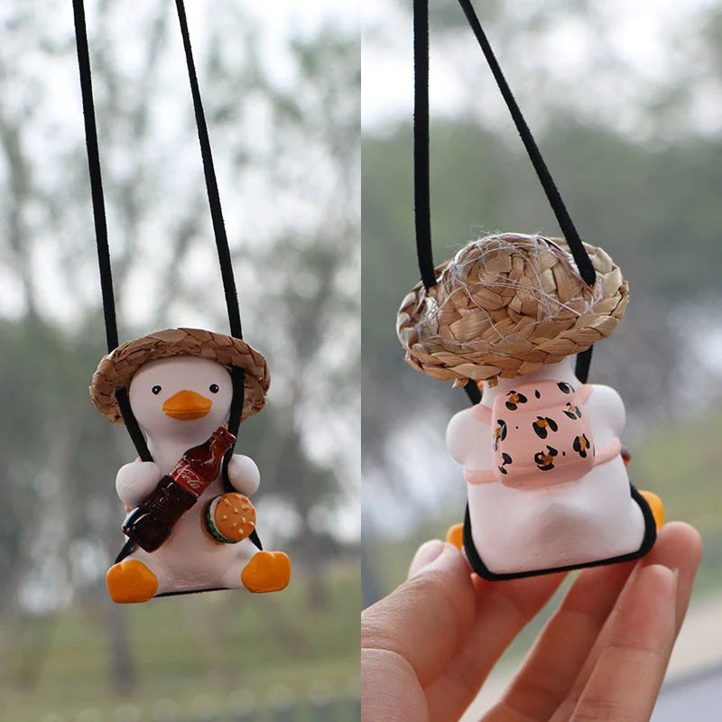 Car Swing Duck Ornament hanging from rearview mirror