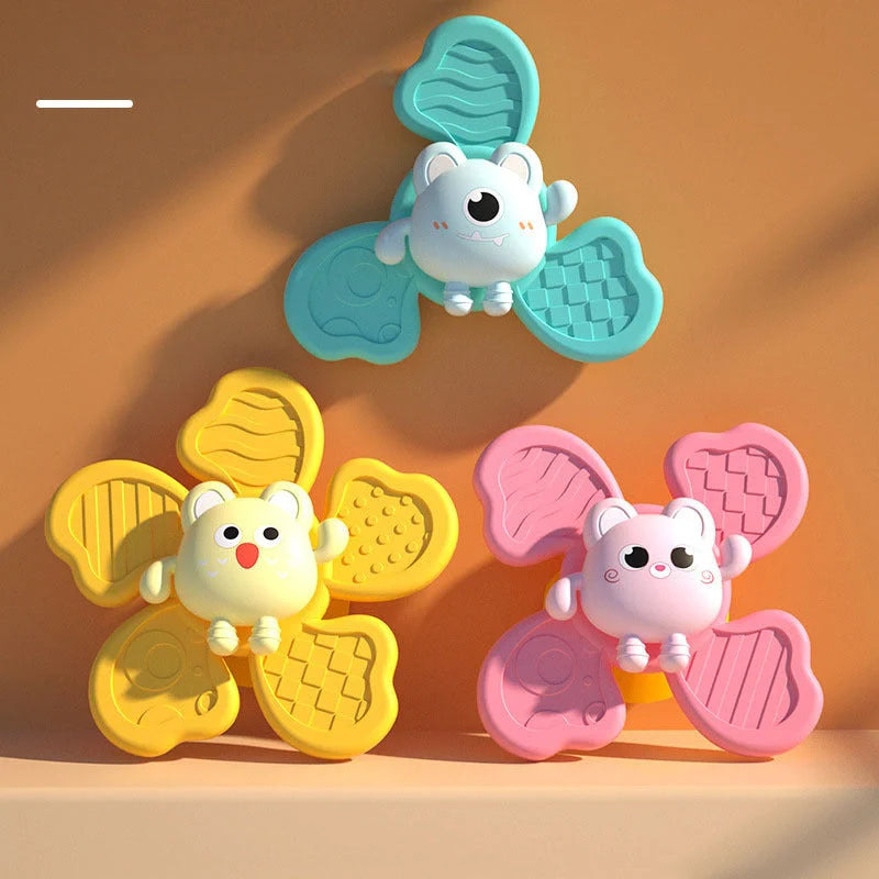 Baby bath spinning top toy with animal shapes and suction cups