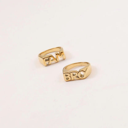 Women's Letter Seal Titanium Steel Plating 18K Gold Ring in various gold tones