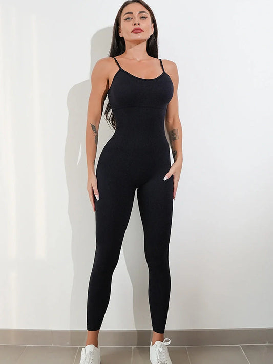 Women's black nylon-spandex unitard with spaghetti straps and tummy control