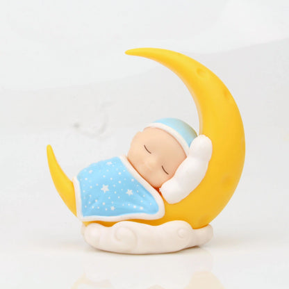 Adorable moon-themed cake toppers with sleeping baby design, perfect for kids' birthday parties and celebrations