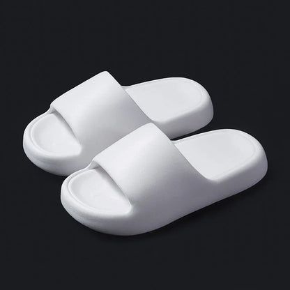 Comfortable EVA foam slip-on slippers in various colors, featuring non-slip soles and a breathable design for indoor and bathroom use.